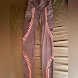 Purple Lululemon leggings with pastel design